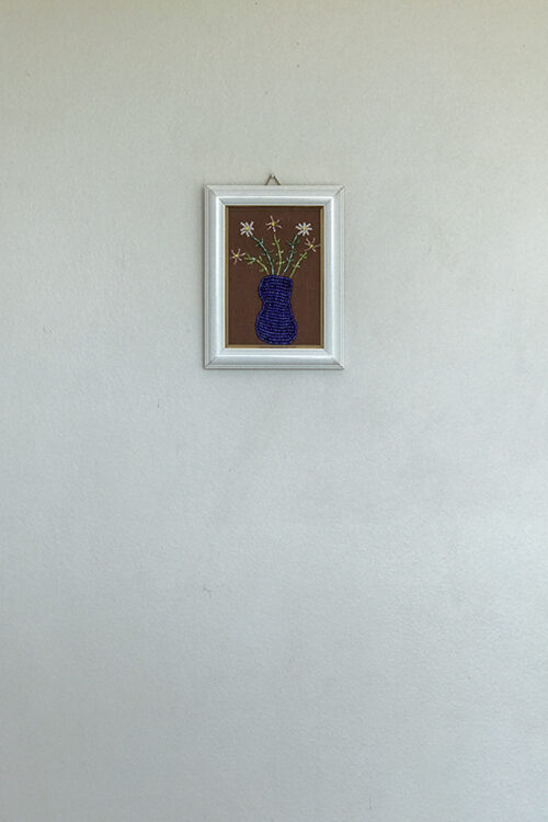 Jarrón azul con flores